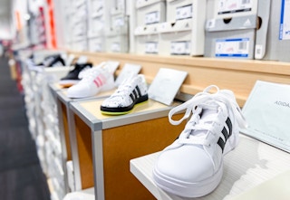 in store shoe display at DSW including Adidas Styles