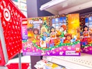 lego friends advent calendar sitting on a shelf in front of a target cart