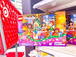 lego friends advent calendar sitting on a shelf in front of a target cart