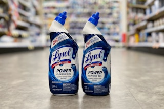 two bottles of lysol toilet bowl cleaner on the floor
