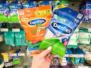 hand holding dentek floss picks at target