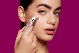 person applying Under Eye Serum