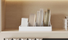 lids in an organizer in a cabinet