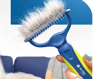 pet grooming rake full of pet hair