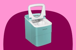 light blue ice maker on a pink and maroon background