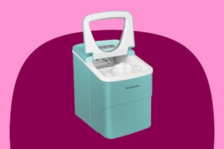 light blue ice maker on a pink and maroon background