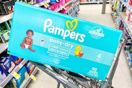 box of pampers diapers in shopping cart