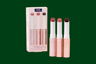 Tarte Lip Set Trio on a dark green background. 
