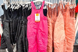 cat & jack snow bibs sitting on a target clothing rack