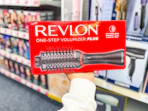 hand holding revlon one-step volumizer in cvs
