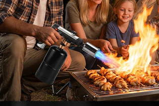 propane torch head being used on grill