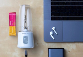 HSN Nutribullet Go next to laptop
