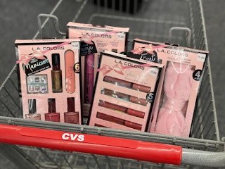 shopping cart with L.A. Colors gift sets inside