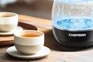 Chefman Electric Kettle next to a tea cup