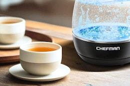 Chefman Electric Kettle next to a tea cup
