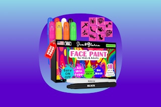 Eight face paint markers are shown behind the face paint box and next to several stencils. Extra black and white ones are in front.
