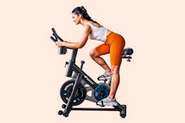 Woman riding a stationary exercise bike