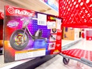 razor rip rider lightshow sitting on a shelf in front of a target cart