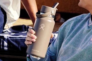 Guy holding the Hydro Flask Water Bottle.