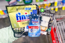 hand holding finish and air wick products