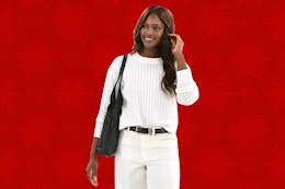 Model wearing a white Time and Tru textured sweater