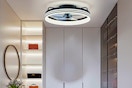 Lifestyle image of the FANNEHONNE led fan light in closet-like setting