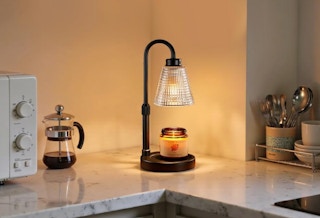 a candle warmer on the counter in a kitchen