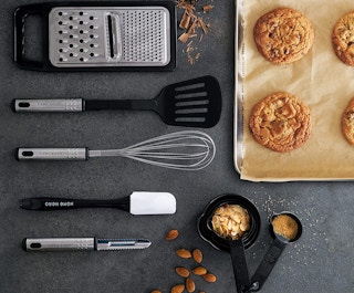 black and metal cookware on a table with cookie dougyh
