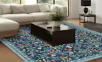 blue floral area rug in living room