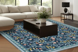 blue floral area rug in living room