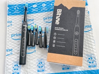 electric toothbrush with extra brush heads