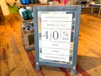 A sign for a sale at Anthropologie for an extra 40% off sale items