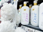 Dove Body Wash by white loofahs in Walmart store