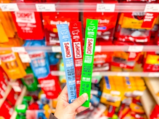 hand holding chomps beef sticks at target