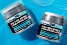 jars of face cream on a blue background