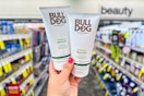 person holding 2 bulldog shave gels in an aisle