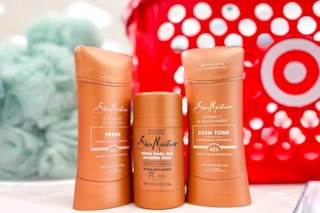 3 SheaMoisture Deodorant sitting on a table in front of a target basket