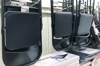 plastic dev group folding chairs on a shelf at target