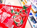 2 palmolive dish soap bottles sitting in a target cart