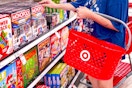 person looking at the board games at Target