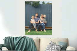 photo poster hanging over a couch