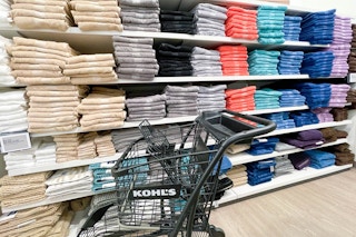 the big one towels on shelves near cart