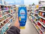 hand holding dawn dish soap in walgreens