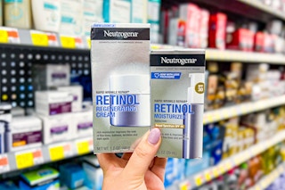 Two Neutrogena Retinol Products held up in beauty section of Walmart