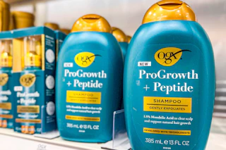ogx progrowth shampoo and conditioner on shelf