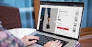 Someone shopping for the new Lululemon dual pouch wristlet on a laptop