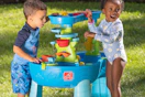 kids' playing with Step2 splash table