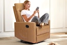 a woman sitting in a recliner chair