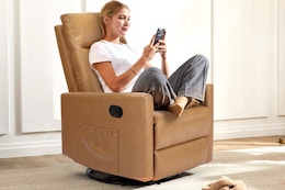 a woman sitting in a recliner chair