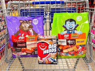 bulk bags of halloween candy in a cart